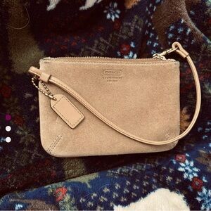 Simple tan Coach wristlet